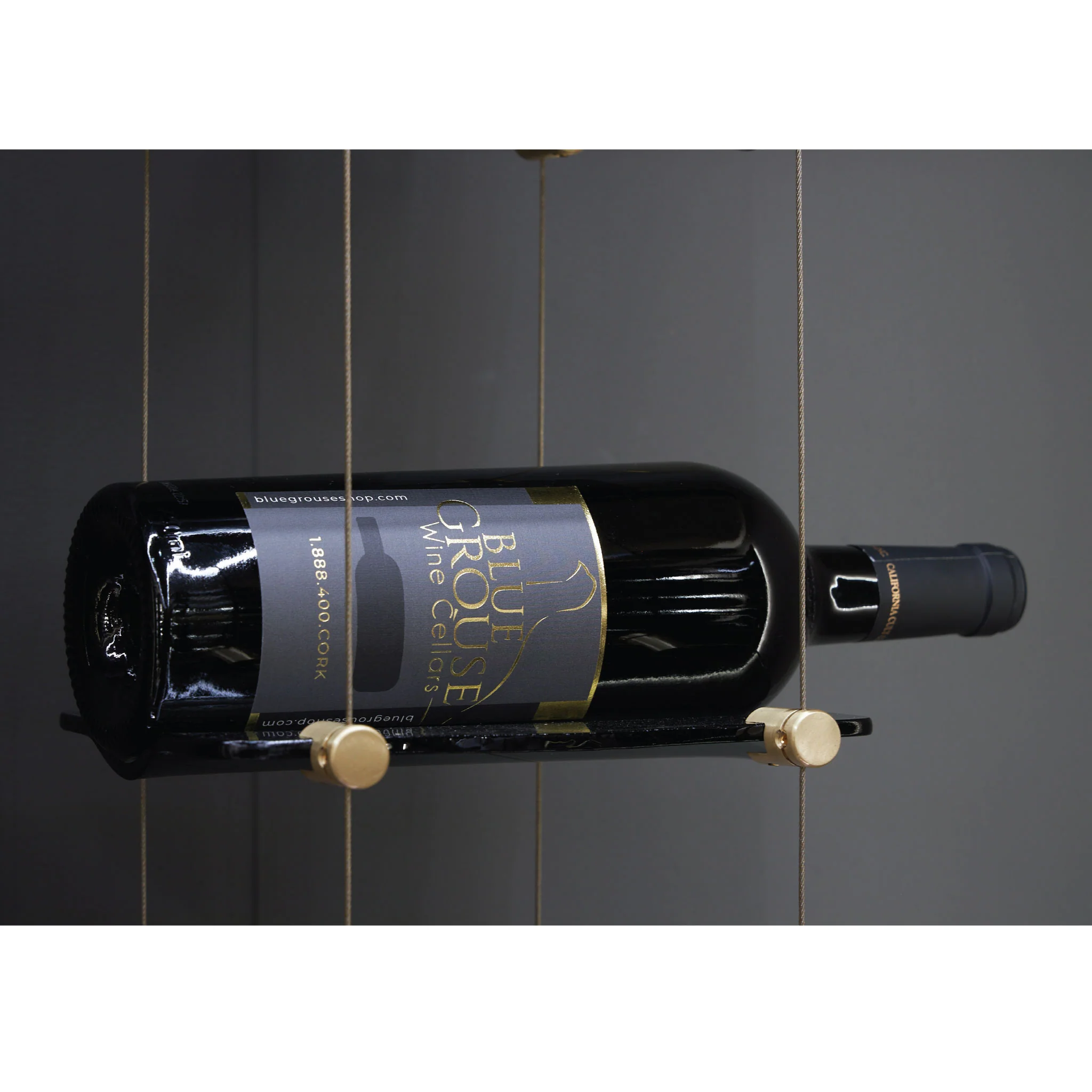 Float-Gold-with-Grey-Glass-Cable-Wine-Racking_a8a8b7a6-ee3d-4e65-9623-a9b2d63a82ce-2.webp